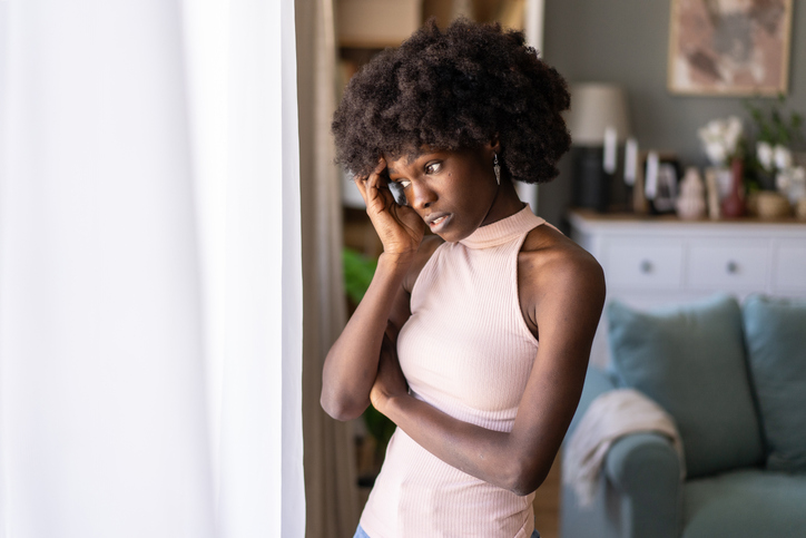 impostor syndrome - A worried woman