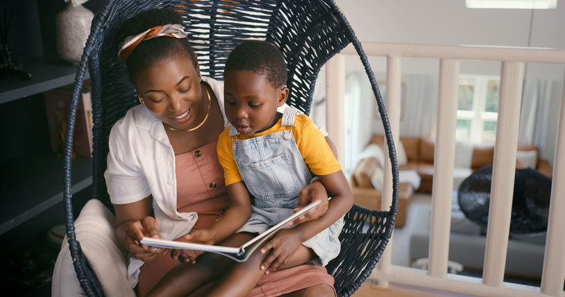 Relax and black woman or mom storytelling to child for growth, development and learning with knowledge for kid. Apartment, mother and daughter with book in home for fairytale with fantasy for family