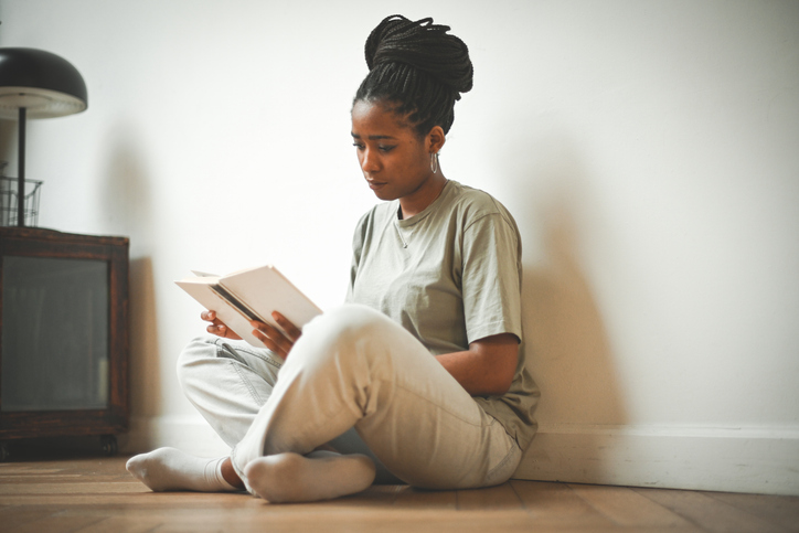 Young woman reading a book