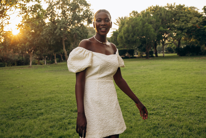 Young African American woman taking walk in the park