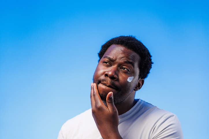 Revitalizing self-care: man with a cream on his face