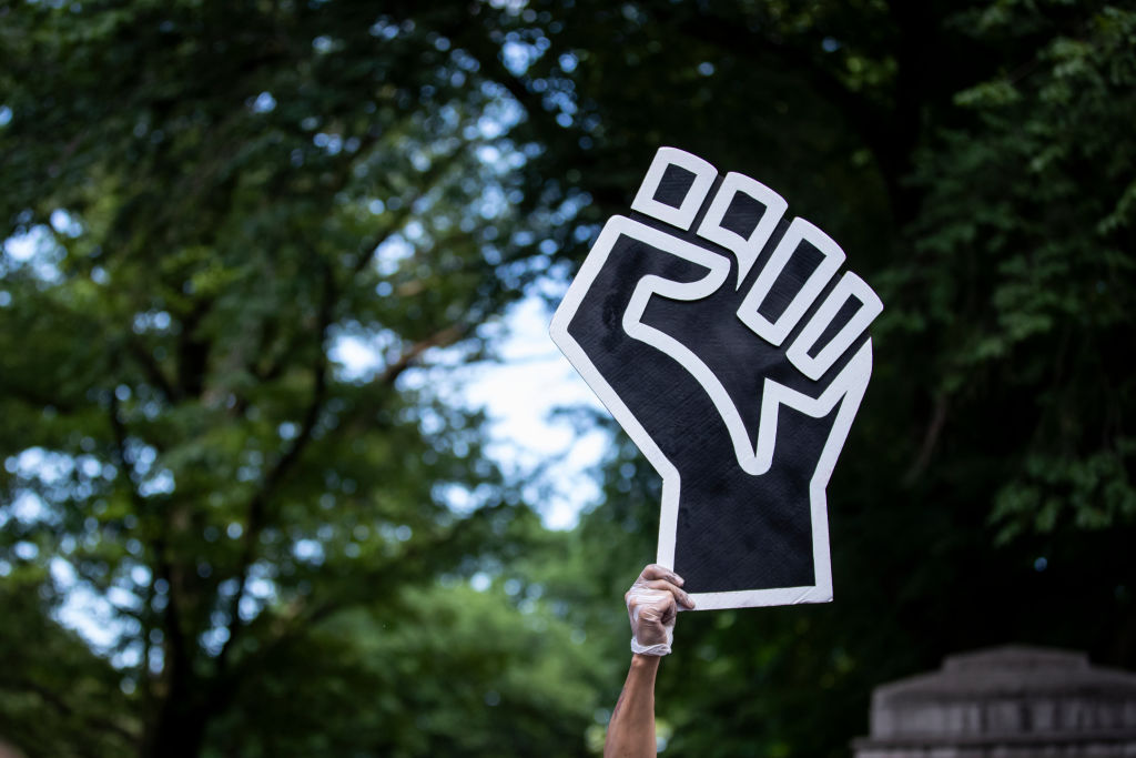 celebrating juneteenth (black fist) - News - George Floyd Protest Donald Trump Birthday Protest - New York City