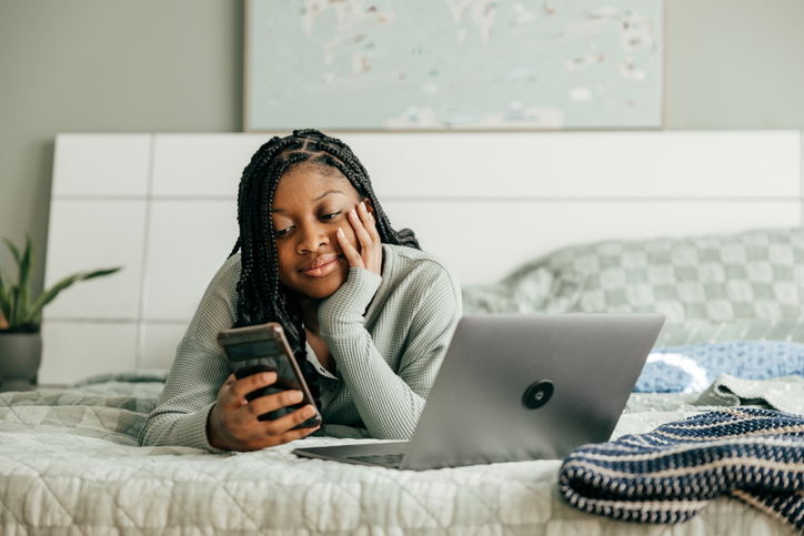 A teen learning about investment strategies online for better financial planning