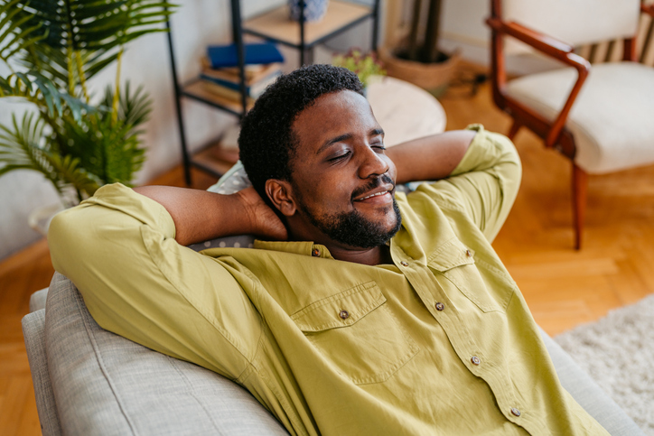 Best Way To Take A Nap - Young Man Relaxing On The Sofa At Home