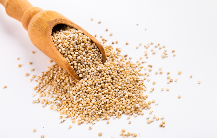 Organic protein sources. Heap of White quinoa
