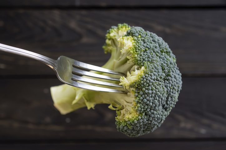 Broccoli Recall - A large broccoli head stabbed on a silver fork