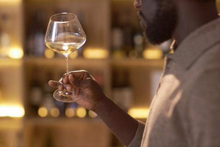 How Alcohol Affects Sleep - Unrecognizable Sommelier Estimating Wine Quality