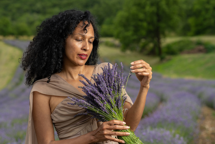 Portrait of a Latina woman in a field of lavender