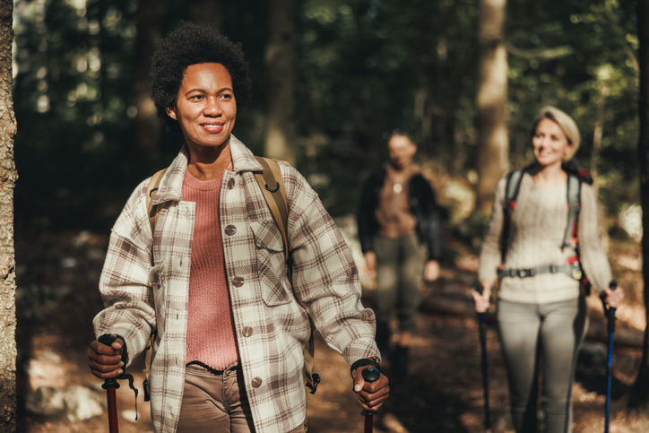 Women Friends Hiking On Mountain